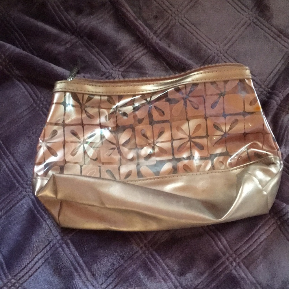 Small gold cosmetic pouch